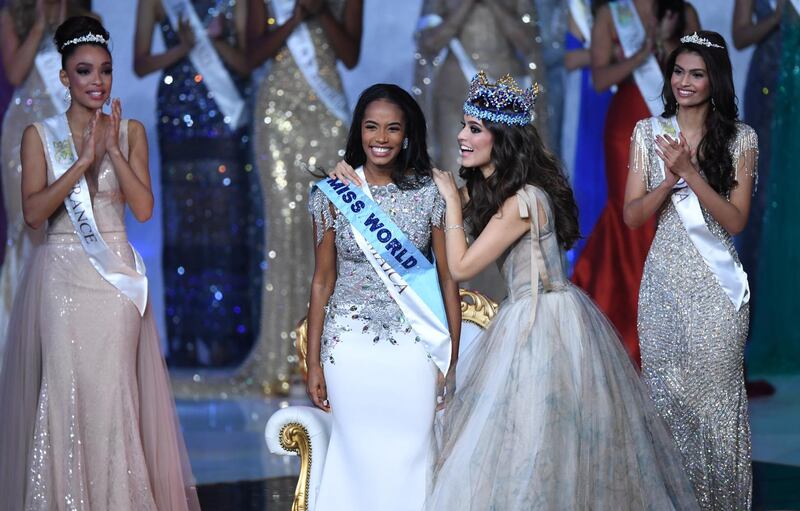 epa08072216 Miss World 2019, Miss Jamaica Toni-Ann Singh (C) reacts during the final in the Excel centre in London, Britain, 14 December 2019. The annual Miss World competition returns to London for its 69th year.  EPA/FACUNDO ARRIZABALAGA