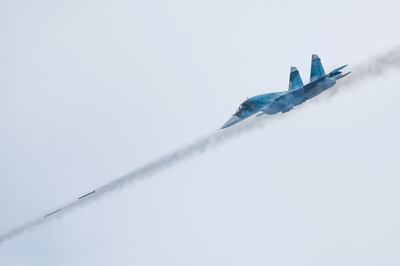 A Russian Sukhoi Su-34 fighter-bomber fires missiles. Reuters