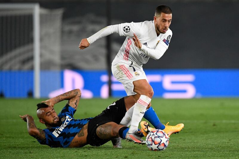 Inter Milan's Chilean midfielder Arturo Vidal vies with Real Madrid's Belgian forward Eden Hazard. AFP