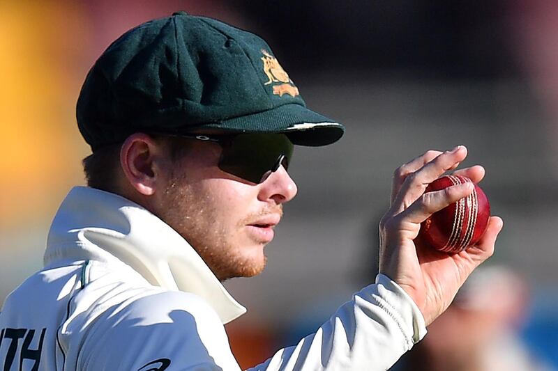 (FILES) In this file photo taken on November 23, 2019, Australia's Steve Smith holds the ball on day three of the first Test cricket match between Pakistan and Australia at the Gabba in Brisbane. A two-year leadership ban slapped on Steve Smith after the ball-tampering scandal in South Africa ended on March 29, 2020, leaving the master batsman free to skipper Australia again. - -- IMAGE RESTRICTED TO EDITORIAL USE - STRICTLY NO COMMERCIAL USE --
 / AFP / AFP  / Saeed KHAN / -- IMAGE RESTRICTED TO EDITORIAL USE - STRICTLY NO COMMERCIAL USE --
