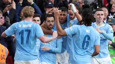 Manchester City's Bernardo Silva, center left, celebrates after scoring his side's opening goal during the English FA Cup semifinal soccer match between Manchester City and Chelsea at Wembley stadium in London, Saturday, April 20, 2024.  (AP Photo / Ian Walton)