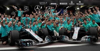 Formula One F1 - Brazilian Grand Prix - Autodromo Jose Carlos Pace, Interlagos, Sao Paulo, Brazil - November 11, 2018  Mercedes' Lewis Hamilton, Mercedes' Valtteri Bottas, Executive Director Toto Wolff and team members pose after winning the constructors championship  REUTERS/Ricardo Moraes