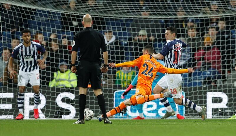 Newcastle United's Miguel Almiron scores to make it 2-0 against WBA in their FA Cup fifth round match at The Hawthorns. Reuters