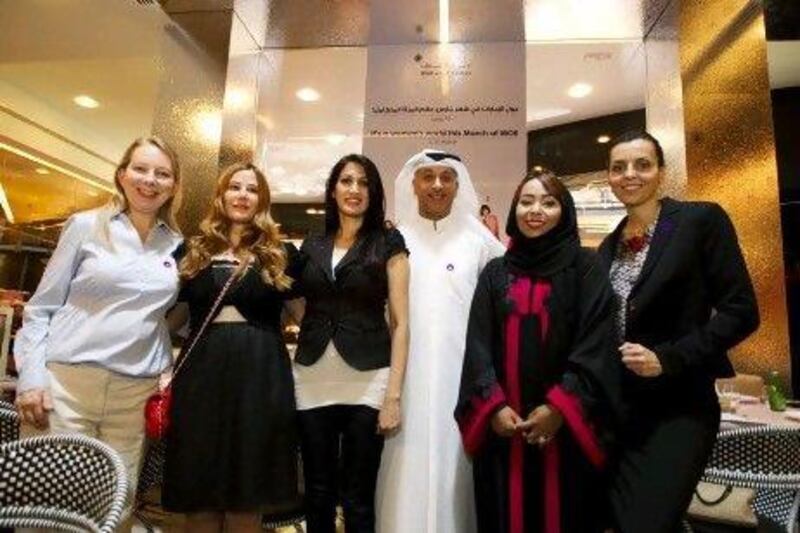 (L to R), Katrina Thornely, Lama Bazzari, Saher Shaikh, Fuad Monsoor Sharaf, Ebtisam Abdulaziz and Alexandra Redorta are photographed at the launch of the Mall of the Emirates International Women's Day campaign yesterday.