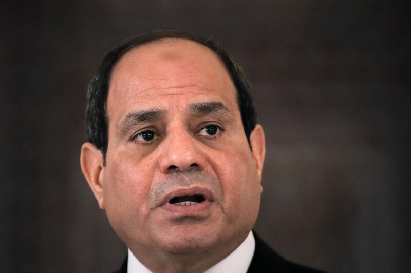 FILE - In this June 19, 2019 file photo, Egyptian President Abdel Fattah el-Sisi speaks during a press conference in Bucharest, Romania.  Abdel-Fattah el-Sissi says Saturday, Sept. 14, that allegations of embezzlement and misuse of public funds in building new presidential palaces are "sheer lies and defamation." He says: "I've built presidential palaces and I will continue to do so. I am building a new country. ... All of this is not mine. It's Egypt's."  (AP Photo/Vadim Ghirda, File)