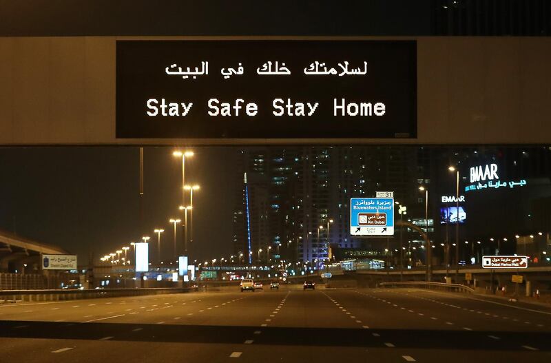 DUBAI, UNITED ARAB EMIRATES , April 05 – 2020 :- Stay Safe Stay Home message on Sheikh Zayed road in Dubai.  Dubai is conducting 24 hours sterilisation programme across all areas and communities in the Emirate and told residents to stay at home. UAE government told residents to wear face mask and gloves all the times outside the home. (Pawan Singh / The National) For News/Online/Instagram.