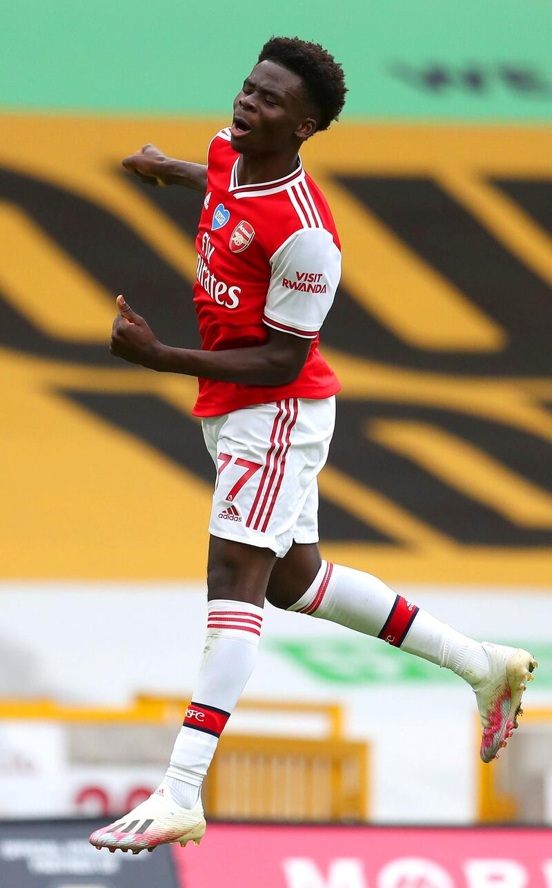 Bukayo Saka - 7: Teenager celebrated signing new contract by scoring first Premier League goal with beautiful left-footed finish towards end of first half. Had barely found an Arsenal player with a pass before that, though. Getty