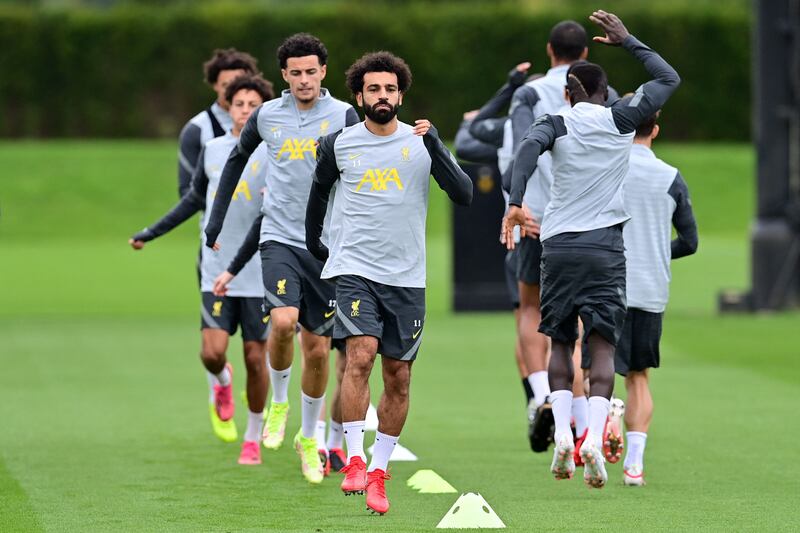 Liverpool's Mohamed Salah with teammates ahead of their Champions League game. AFP