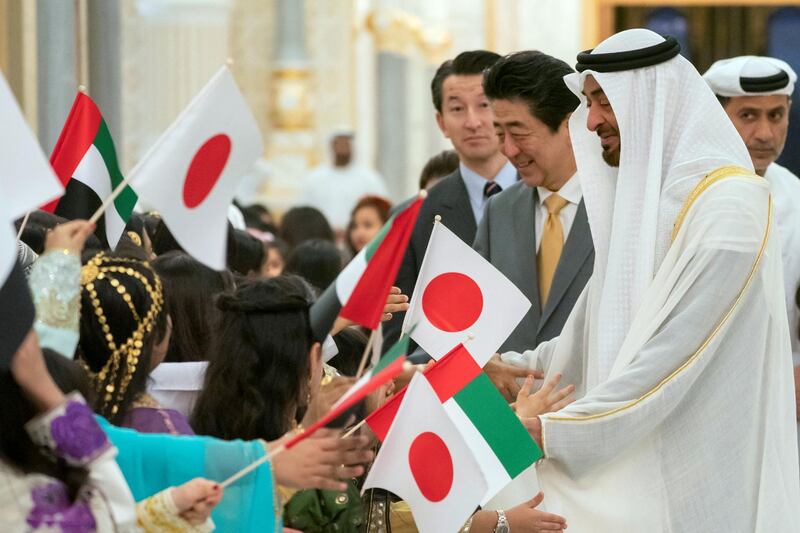 ABU DHABI, UNITED ARAB EMIRATES - January 13, 2020: School children welcome HH Sheikh Mohamed bin Zayed Al Nahyan, Crown Prince of Abu Dhabi and Deputy Supreme Commander of the UAE Armed Forces (R) and HE Shinzo Abe, Prime Minister of Japan (2nd R), during a reception, at Qasr Al Watan.

( Hamad Al Kaabi / Ministry of Presidential Affairs )
---