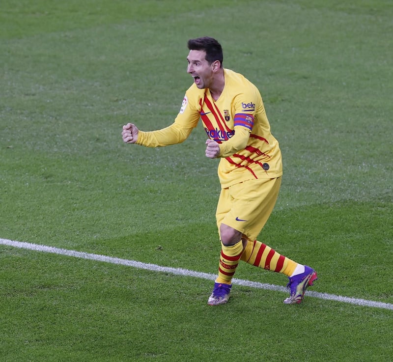 Messi celebrates after scoring the second. EPA