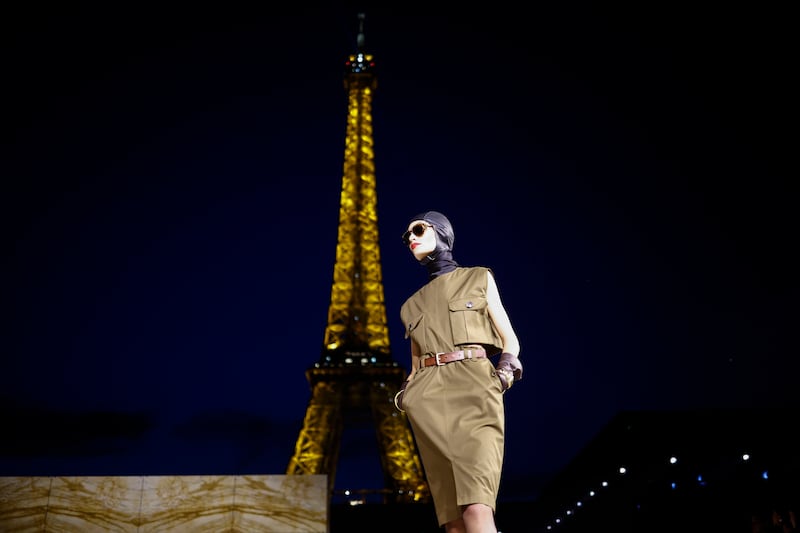 A model presents a creation of the Spring/Summer 2024 Womenswear collection by Saint Laurent. EPA