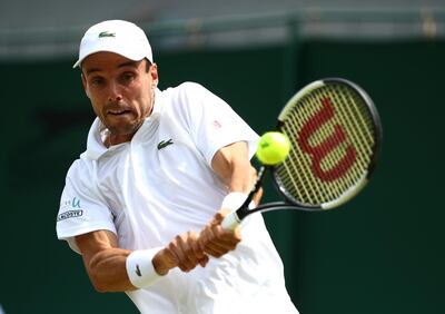 Tennis - Wimbledon - All England Lawn Tennis and Croquet Club, London, Britain - July 8, 2019  Spain's Roberto Bautista Agut in action during his fourth round match against France's Benoit Paire  REUTERS/Hannah McKay