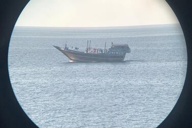 A dhow that aroused suspicion is shown through the bridge binoculars onboard ‘HMS Montrose’. Lt Cdr Steve Jones RN