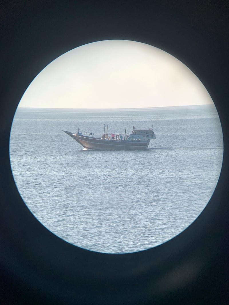 A suspicious dhow shown through the bridge binoculars onboard HMS Montrose. (Photo Lt Cdr Steve Jones RN)