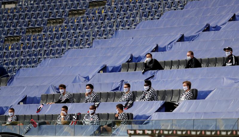 EINTRACHT FRANKFURT 1 BORUSSIA MONCHENGLADBACH 3.  Frankfurt team members wearing face masks and remain socially distanced during the game. Reuters