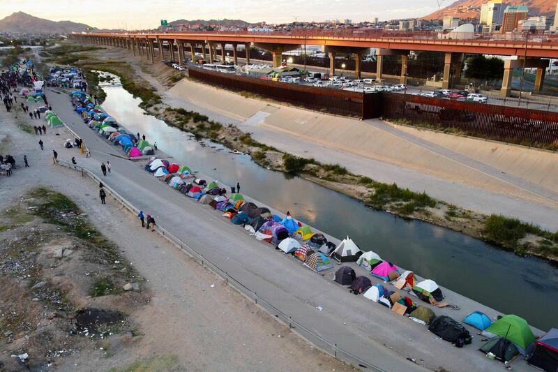 A migrant camp on the banks of the Rio Bravo river (or Rio Grande as it is known in the US) in Ciudad Juarez, Mexico. A US federal judge on November 15 ruled that the government could not use public health rules to block the entry of asylum-seeking migrants, the apparent end of a controversial Donald Trump-era policy criticised as cruel and ineffective. AFP