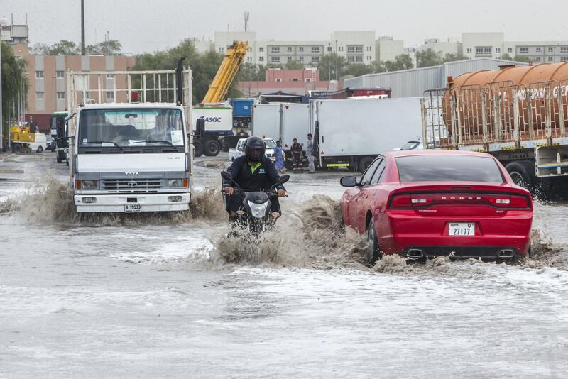 Dubai, United Arab Emirates - Flooded street due to rain today in Al Quoz Industrial area.  Leslie Pableo for The National 