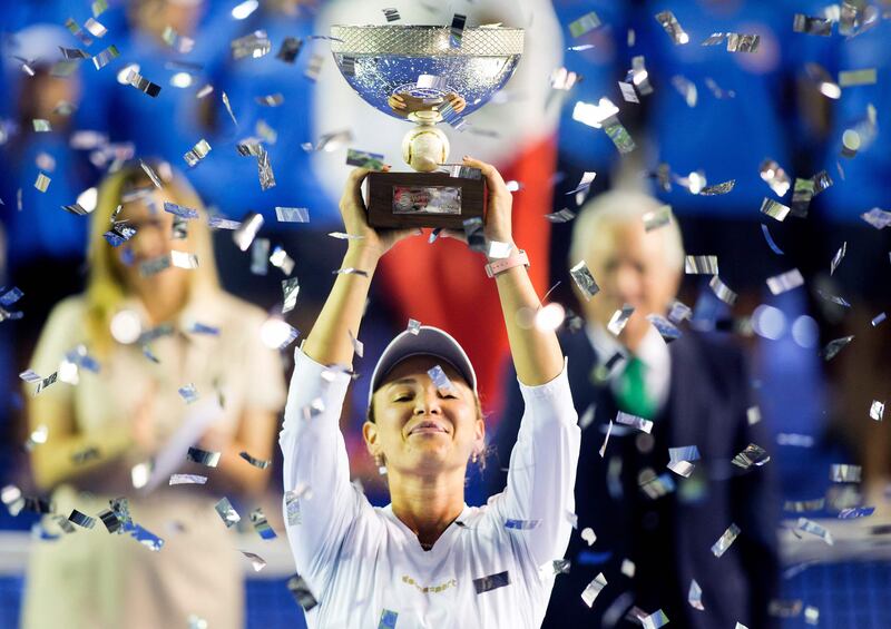 Croatian tennis player Donna Vekic raises the trophy after winning the Monterrey WTA Open final against France’s Caroline Garcia in Monterrey, Mexico. AFP