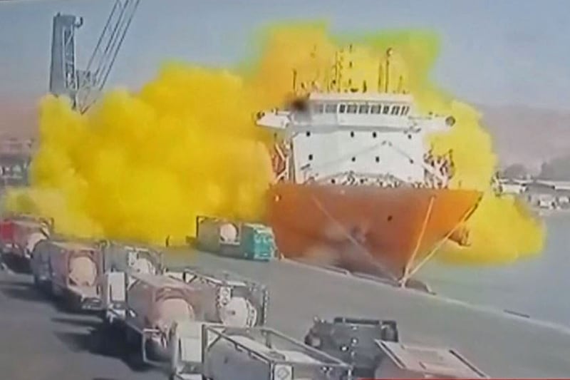 Jordanian state TV footage shows the moment a large cylinder falls from a crane and hits a moored vessel, causing a violent explosion. AFP