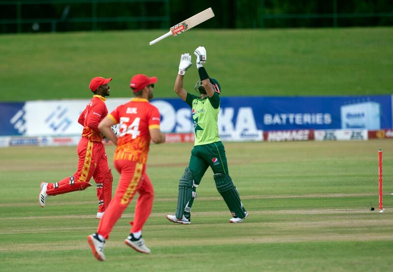 Pakistan batsman Mohammad Rizwan throws his bat in the air after been dismissed during the T20 against Zimbabwe at the Harare Sports Club on Friday, April 23, 2021. AP