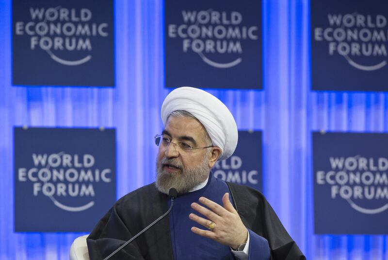 Iranian president Hassan Rouhani gestures as he speaks during a session of the World Economic Forum in Davos. AP Photo / Michel Euler