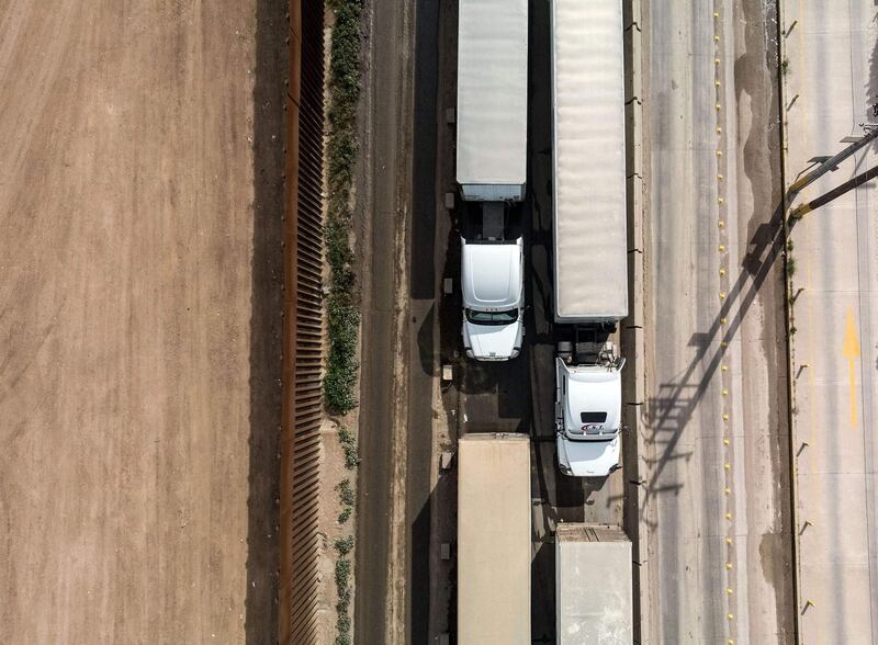 Lorries line up to cross to the United States near the border at Otay Mesa crossing port in Tijuana, Baja California state, Mexico. AFP