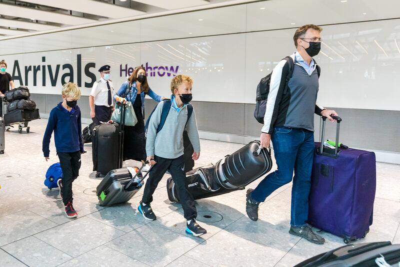 Passengers arrive at Heathrow. EPA