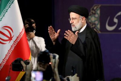 Ebrahim Raisi, head of Iran's judiciary leaves a news conference after registering his candidacy for the June 18 presidential elections at the elections headquarters of the Interior Ministry in Tehran, Iran, Saturday, May 15, 2021. (AP Photo/Ebrahim Noroozi)