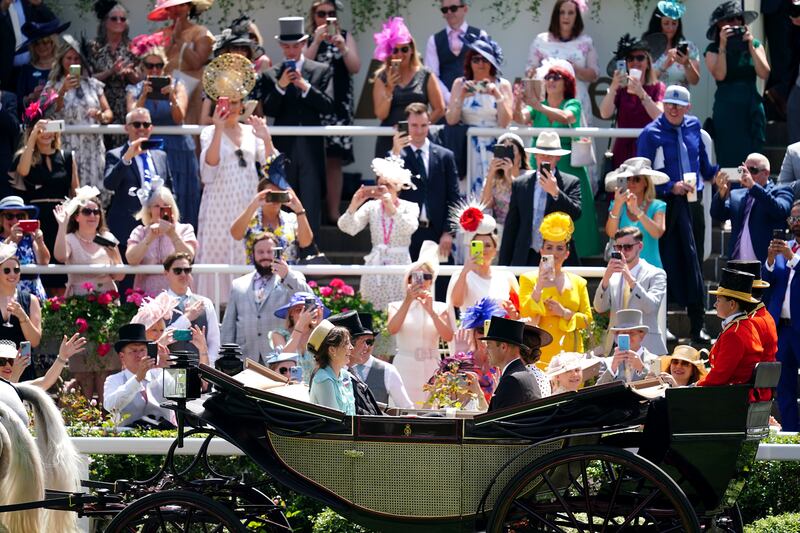 The couple led the royal procession as temperatures soared across the UK. Reuters