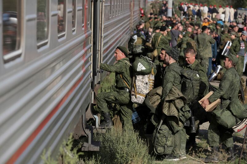 Russian recruits board the train to Ukraine in Volgograd. AP