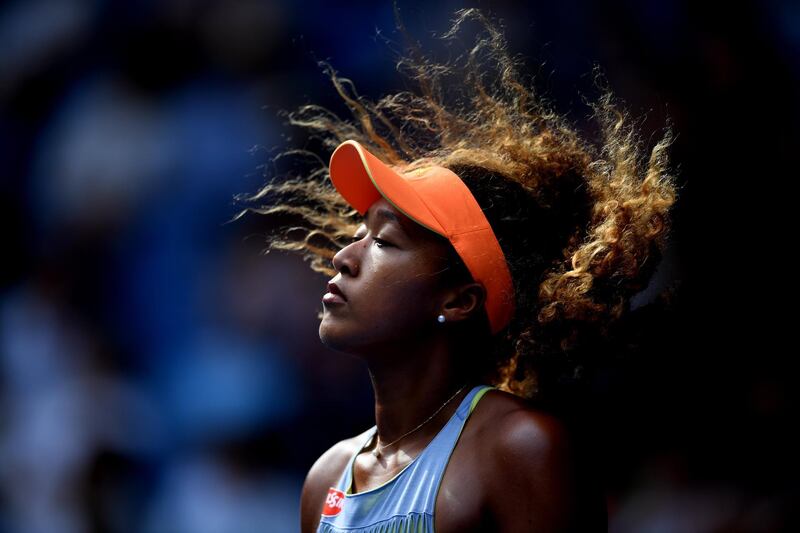 Naomi Osaka reacts during her third round match against Ashleigh Barty. Lukas Coch / EPA