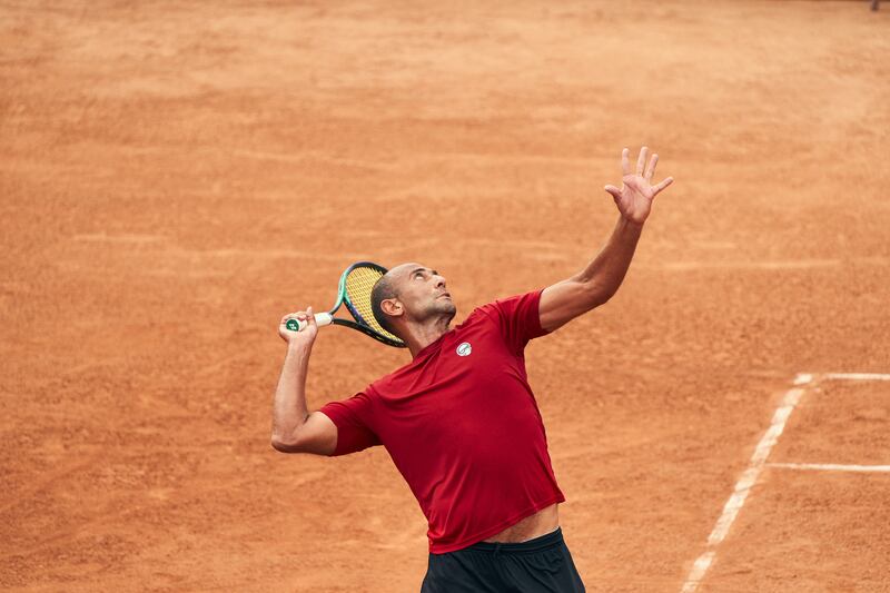 Mohamed Safwat serves against Ecuador. Omar Zain