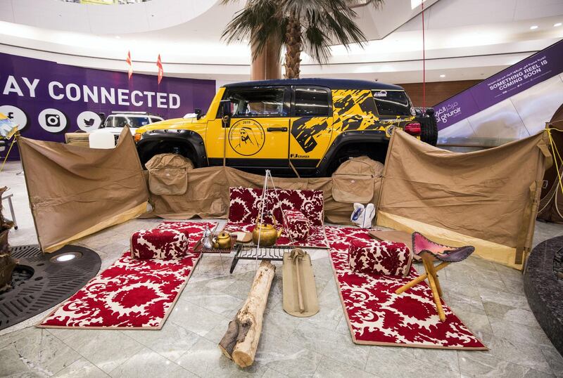 DUBAI, UNITED ARAB EMIRATES -Winner of  King of family car- yellow FJ, desert seating set, wind barrier fabric walls,picnic table, full bathroom set (including shower), a kitchenette for cooking, lights setup for night time while camping, tent with full bedroom equipment  at UAE Offroaders Show at Al Ghurair Centre.  Leslie Pableo for The National for Adam Workman's story