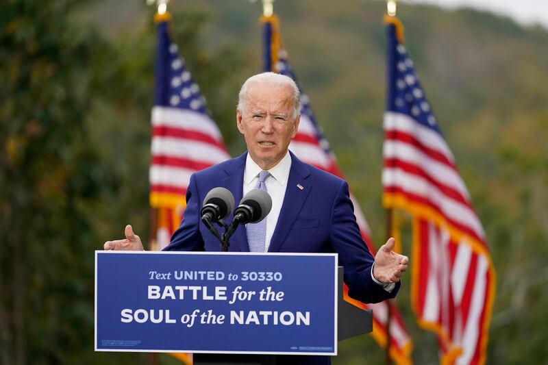 FILE - In this Oct. 27, 2020, file photo, then-Democratic presidential candidate former Vice President Joe Biden speaks at Mountain Top Inn & Resort in Warm Springs, Ga. President-elect Joe Biden has evoked Franklin Delano Roosevelt in promising a remaking of America unseen since the New Deal. Pledging to emulate some of the loftiest reforms in the nationâ€™s history has left him with towering promises to keep. And Biden hopes to deliver against the backdrop of the pandemic and searing national division. (AP Photo/Andrew Harnik, File)