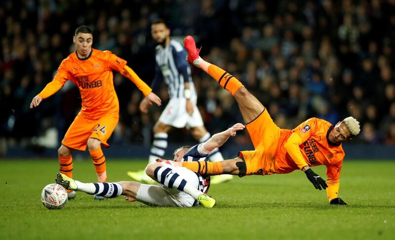 Joelinton hits the deck after a challenge by West Bromwich Albion's Chris Brunt during Newcastle's FA Cup fifth-round win at The Hawthorns in March. Reuters