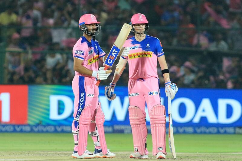 Rajasthan Royals' Ajinkya Rahane, left, celebrates his fifty during the VIVO IPL T20 cricket match between Rajasthan Royals and Delhi Capitals in Jaipur, India, Monday, April 22, 2019. (AP Photo/Vishal Bhatnagar)