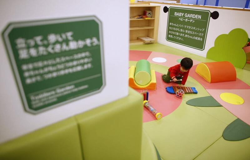 With daycare services difficult to find in Japan, companies are providing them to keep mothers in the workforce. Toru Hanai / Reuters.