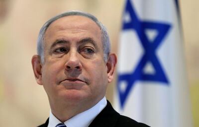 TOPSHOT - Israeli Prime Minister Benjamin Netanyahu attends a cabinet meeting of the new government at Chagall State Hall in the Knesset (Israeli parliament) in Jerusalem on May 24, 2020.  / AFP / POOL / ABIR SULTAN
