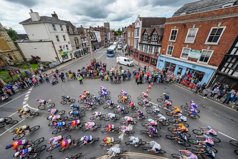 The peloton rides through Tewkesbury in England during stage three of The Women's Tour. PA