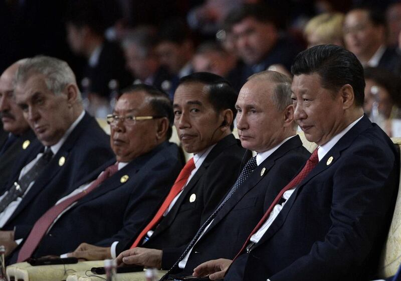 Indonesian president Joko Widodo, Russian president Vladimir Putin and Chinese president Xi Jinping in Beijing on Sunday, May 14. Alexei Nikolsky / AP