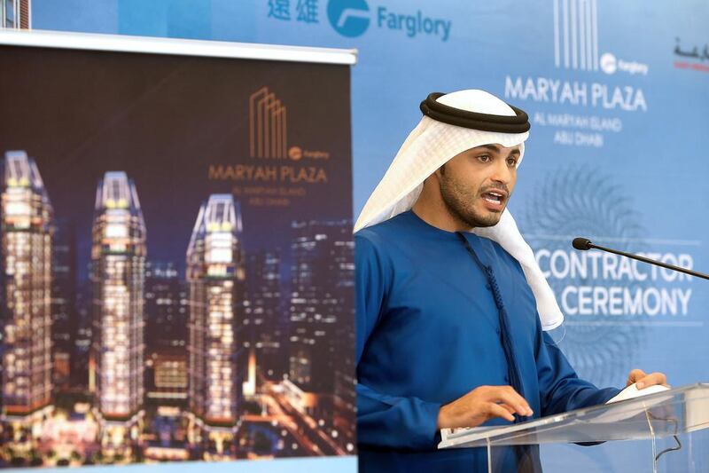 Talal Saleh, Al Fara’a Group’s vice chairman, announces yesterday that his group was awarded the main contract to build Maryah Plaza by the Taiwan-based developer Farglory. Ravindranath K / The National