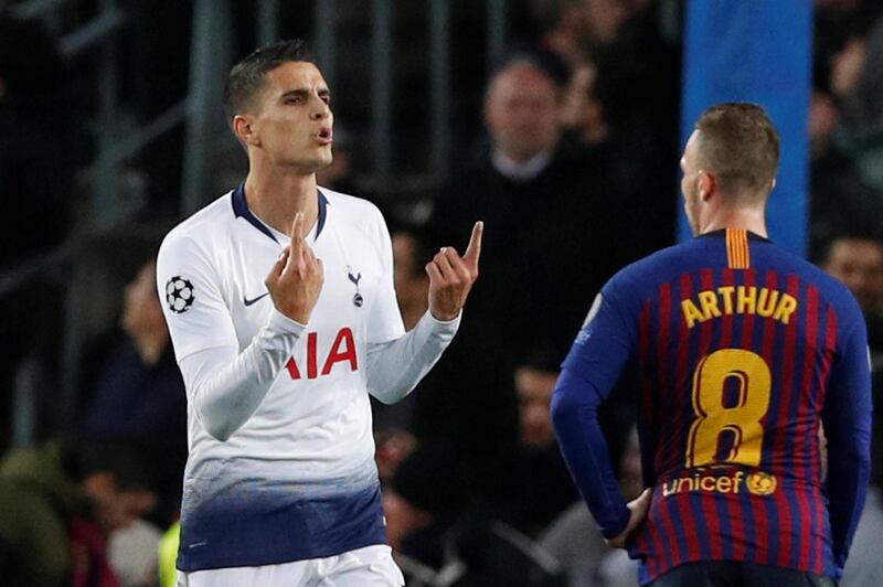 Tottenham's Erik Lamela celebrates after hearing news that Inter Milan had drawn 1-1 with PSV Eindoven, a result that put Spurs through to the last 16. Reuters