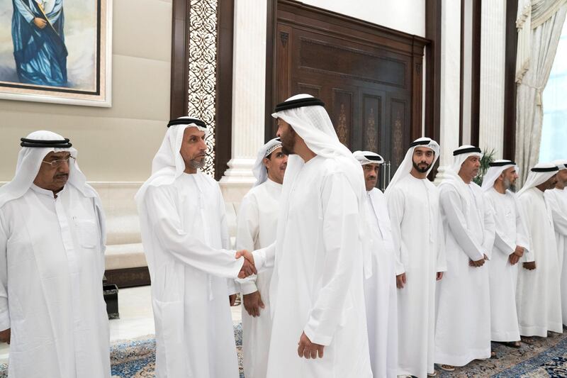 ABU DHABI, UNITED ARAB EMIRATES - June 05, 2018: HH Sheikh Mohamed bin Zayed Al Nahyan Crown Prince of Abu Dhabi Deputy Supreme Commander of the UAE Armed Forces (R), greets a retired member of the UAE Armed Forces, during an iftar reception at Al Bateen Palace. 


( Mohamed Al Hammadi / Crown Prince Court - Abu Dhabi )
---