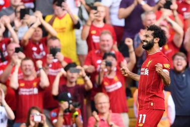 LIVERPOOL, ENGLAND - AUGUST 24: Mohamed Salah of Liverpool celebrates after scoring his team's third goal during the Premier League match between Liverpool FC and Arsenal FC at Anfield on August 24, 2019 in Liverpool, United Kingdom. (Photo by Laurence Griffiths/Getty Images)