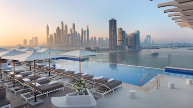 The rooftop pool at voco Dubai The Palm offers stunning views of Dubai Marina and the Arabian Gulf. Photo: voco Dubai The Palm