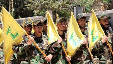 Hezbollah fighters take part in a parade in Baalbek, Lebanon, in May 2022. AFP