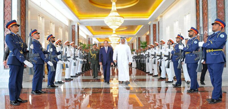A handout picture provided by the Egyptian Presidency shows Abu Dhabi Crown Prince and Deputy Supreme Commander of the UAE Armed Forces Mohammed bin Zayed al-Nahyan (C-R) bidding farewell to Egyptian President Abdel Fattah al-Sisi following their meeting in Abu Dhabi on May 4, 2017. (Photo by HO / EGYPTIAN PRESIDENCY / AFP) / RESTRICTED TO EDITORIAL USE - MANDATORY CREDIT "AFP PHOTO / EGYPTIAN PRESIDENCY - NO MARKETING NO ADVERTISING CAMPAIGNS - DISTRIBUTED AS A SERVICE TO CLIENTS