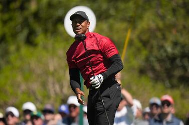 FILE - Tiger Woods watches his tee shot on the fifth hole during the final round at the Masters golf tournament on Sunday, April 10, 2022, in Augusta, Ga.  (AP Photo/Jae C.  Hong, File)
