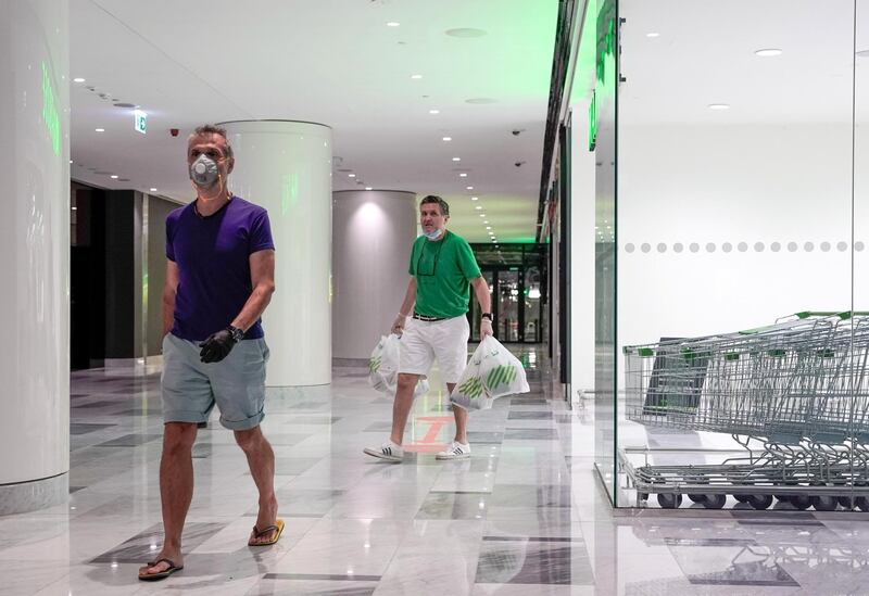 Abu Dhabi, United Arab Emirates, May 2, 2020.  Galleria Mall, Al Maryah Island reopens.  Waitrose customers with some groceries.
Victor Besa / The National
Section:  NA
Reporter: