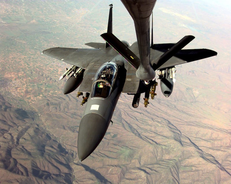 A US Air Force F-15E Strike Eagle refuels in the skies over Macedonia in 1999, as it flies missions in support of Nato Operation Allied Force
